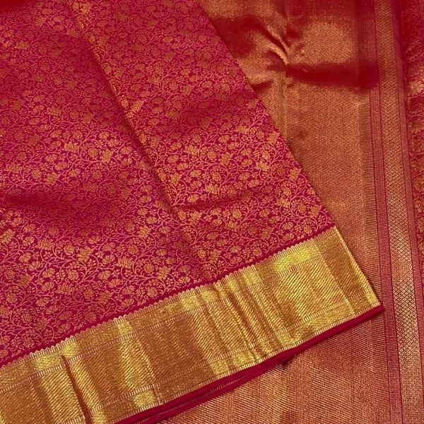 Handwoven pink floral Kanchipuram silk saree with gold zari border