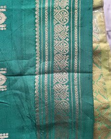 Old temple-border silk saree in green with a gold zari border