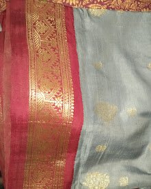 Old two-tone silk saree in grey with a red and gold border