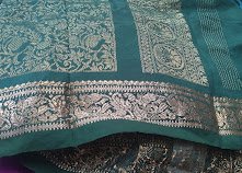 Old silk saree in teal with a fine silver zari border